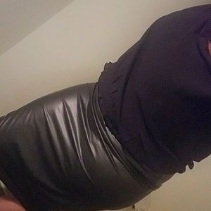 black knee lenth shiny skirt